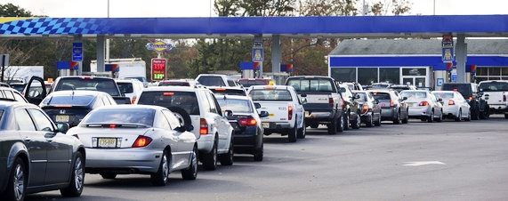 Increase Gas Mileage - Packed line at gas station
