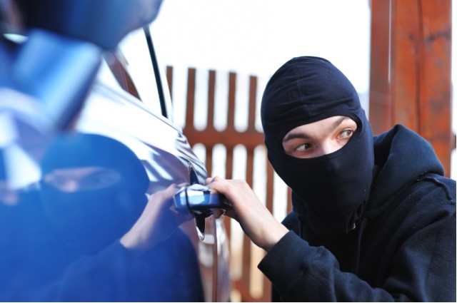 car insurance - thief stealing car
