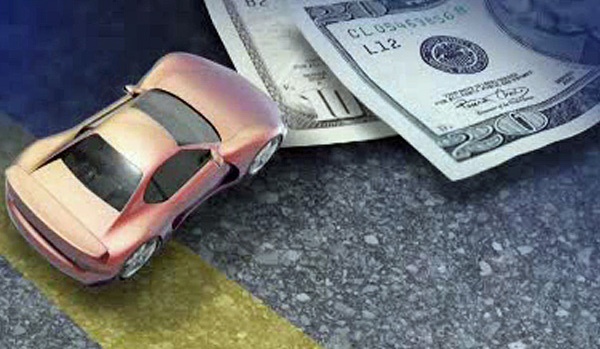 homeowner's insurance - toy car crashing into dollar bills.