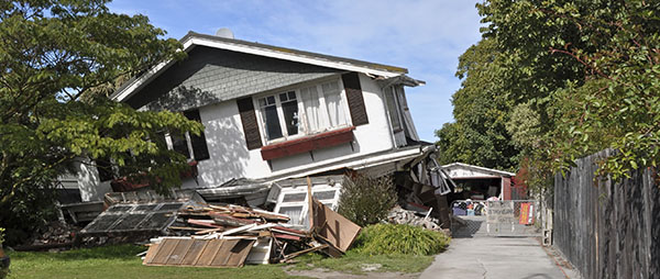Earthquake Insurance - House damaged by earthquake