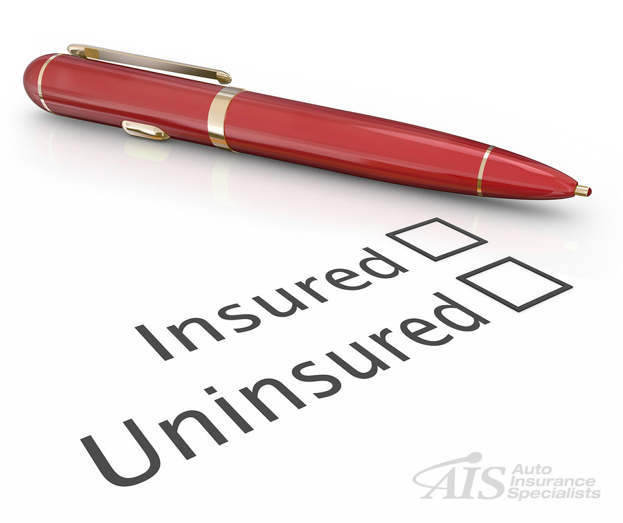 car insurance - red pen with uninsured/insured checkboxes