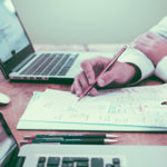 Business Insurance Claim process-laptop-paperwork