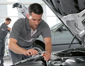 Car Recall - mechanic fixing car