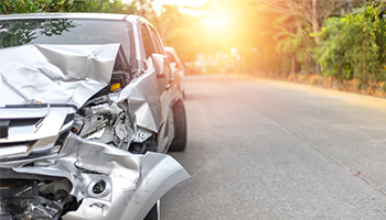 damaged front bumper of car