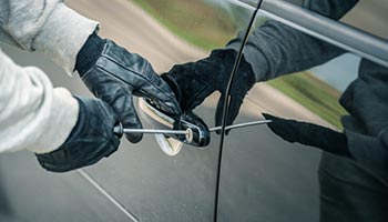 person attempting auto theft with a screwdriver 