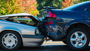 auto accident involving two cars on the road