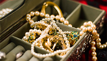 A view of a jewelry collection inside of a jewelry box 