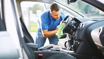 car owner washing their car