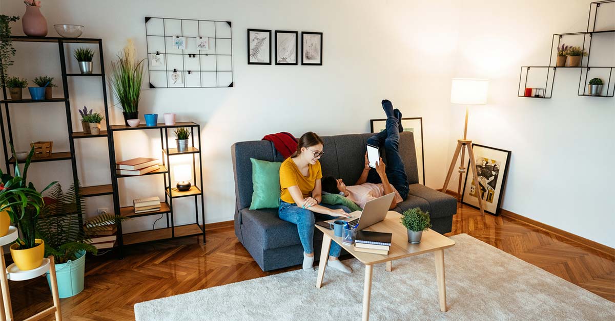 two renters inside their apartment