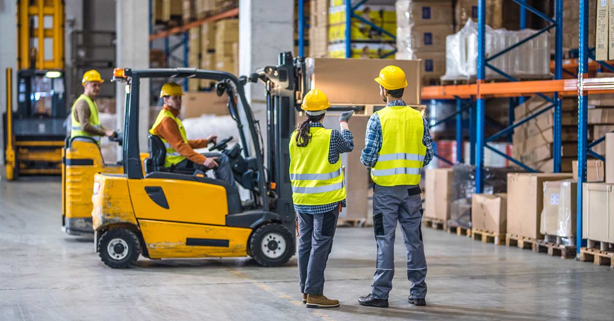 warehouse workers on forklift