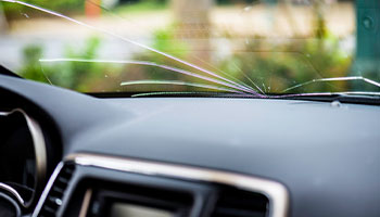 a view of a car's broken windshield