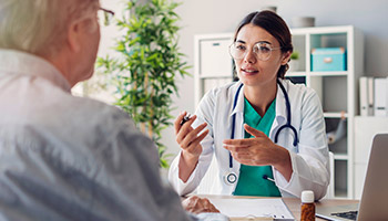 doctor speaking with a patient 