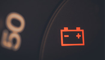 icon indicating the car's battery is not fully charged or must be services