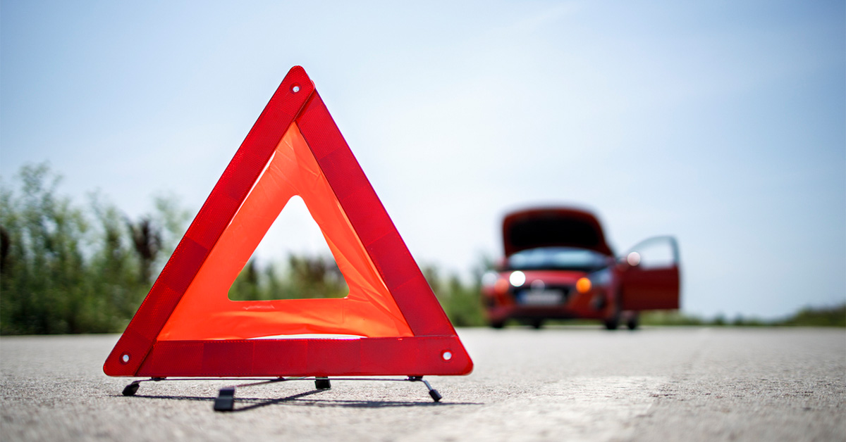 an emergency hazard triangle on the road