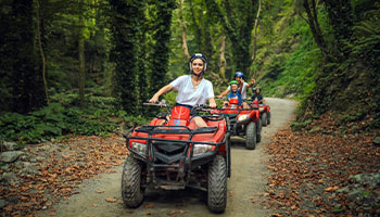 family on an atv trail