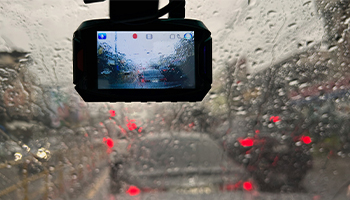 dash cam on car in the rain