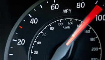 Speedometer showing speeding car