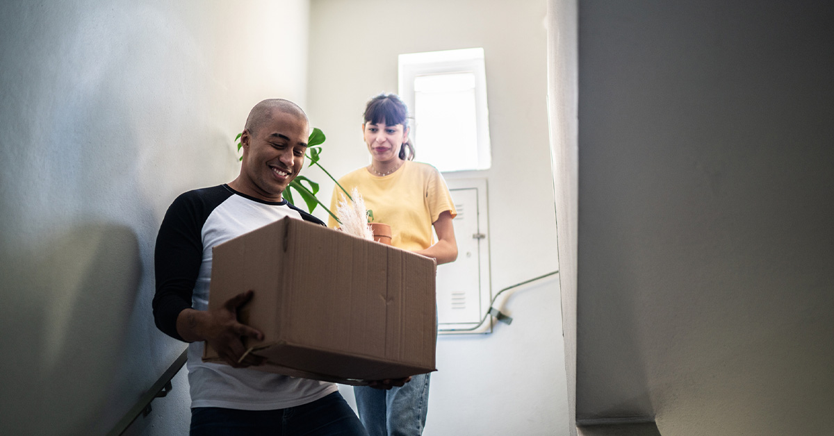 a person moving into their apartment