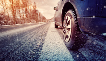 snowy road that affects vehicle performance