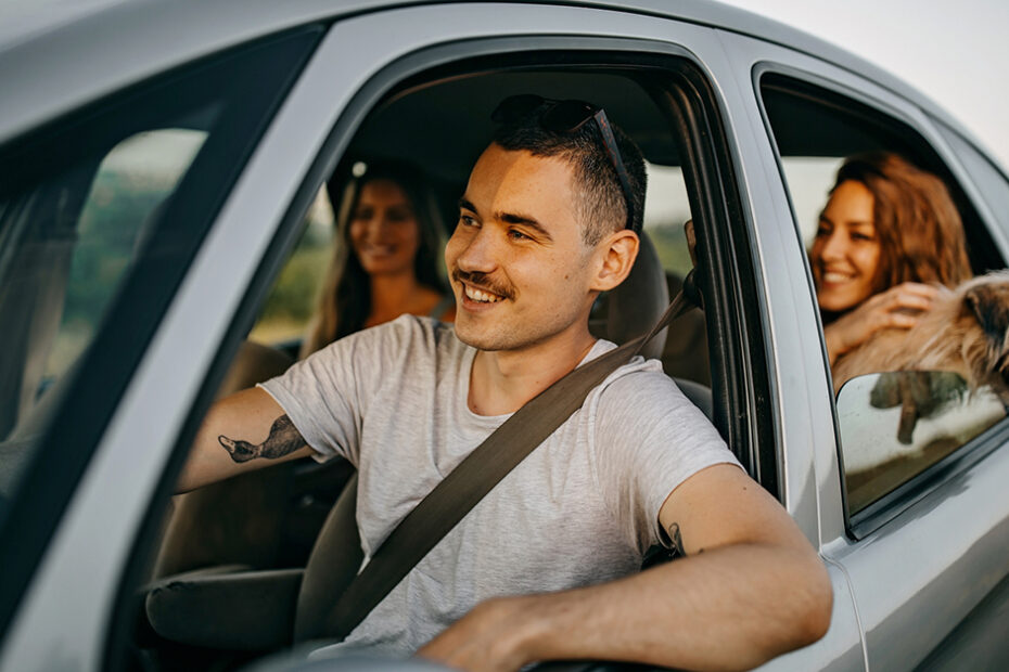 friends in the car together. Does car insurance follow driver or car when friends are road tripping concept photo