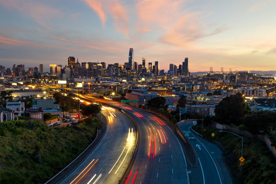 california cars on the road san francisco skyline
