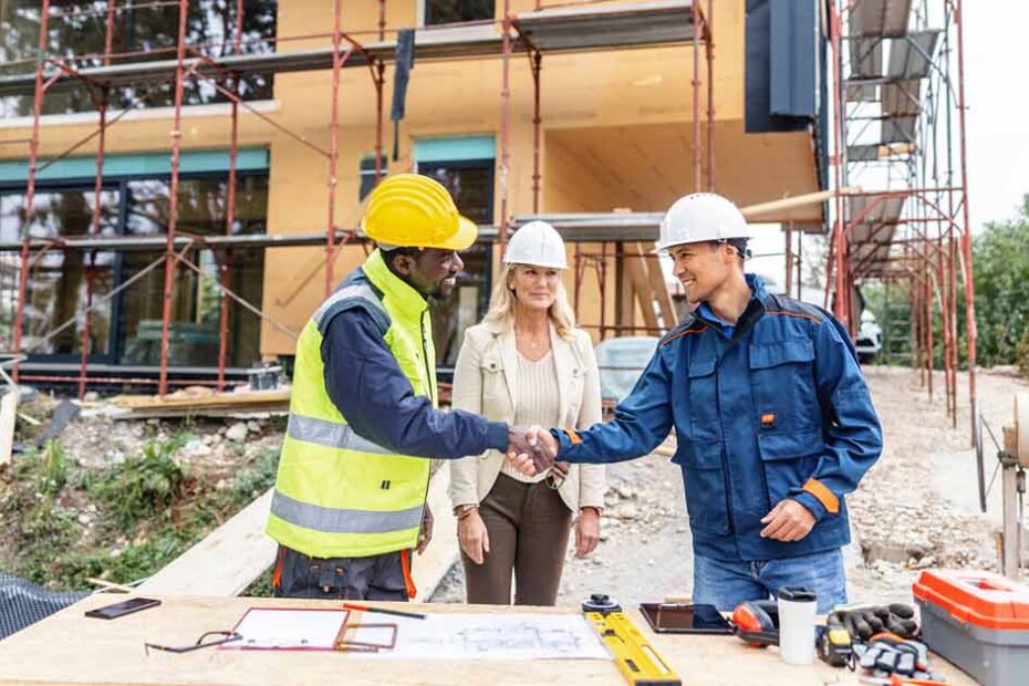 engineer-shaking-hands-with-project-manager-after-obtaining-certificate-of-insurance
