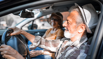 a pair of senior drivers on a road trip